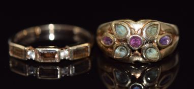 A 9ct gold ring set with topaz and amethyst (size L) and a 9ct gold ring set with quartz, 5.7g, size