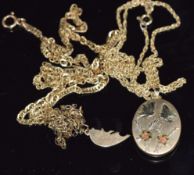 Three 9ct gold chains, a 9ct gold locket and a 9ct gold pendant