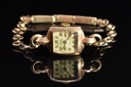 Senate 9ct gold ladies wristwatch with gold hands, Arabic numerals and hour markers, silver dial and