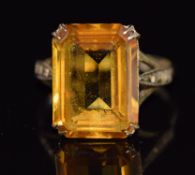 A 9ct gold ring set with an emerald cut citrine 5.4g, size Q