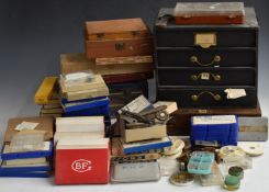 A collection of watchmaker's or repair tools and parts including Tour A Pivoter, movements, glasses,