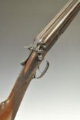 Indistinctly named 20 bore side by side hammer action shotgun with engraved locks, hammers,