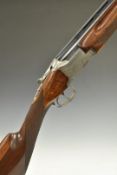 Winchester Super Grade 12 bore over and under ejector shotgun with engraved locks, trigger guard,