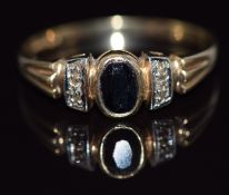 A 9ct gold ring set with an oval cut sapphire, 2g, size Q