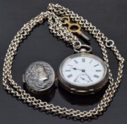 A silver pill box depicting a young woman (9.2g), silver pocket watch and silver chain (30g)