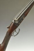 BSA 12 bore side by side shotgun with engraved lock, underside, top plate and thumb lever, chequered