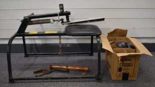 Clay pigeon trap with integral seat.