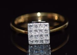 An 18ct gold ring set with 16 princess cut diamonds, total diamond weight approximately 0.5cts, size
