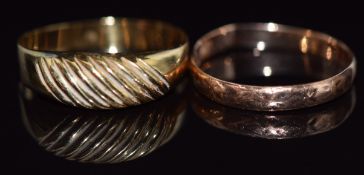 A 9ct rose gold wedding band/ ring (1.1g, size O) and an 18k gold ring, 1.1g, size Q