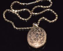 Victorian 9ct gold necklace/ chain (40cm long) and a yellow metal Victorian locket with engraved