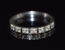A 14k white gold half eternity ring set with diamonds, 1.6g, size K