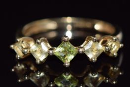 A 9ct gold ring set with peridot, 1.7g, size O
