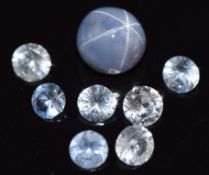 A loose star sapphire and seven round cut sapphires