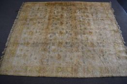 A large Persian rug decorated with animals, 360 x 297cm