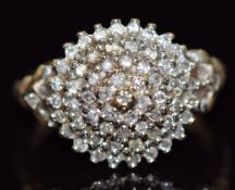A 9ct gold ring set with diamonds in a cluster, total diamond weight approximately 0.5ct, 4.2g, size