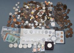 A collection of UK and overseas coinage including high grade Guernsey 8 doubles examples, Irish Free