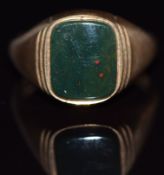A 9ct gold ring set with a bloodstone, 6.6g. size V
