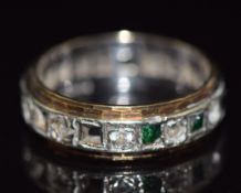 A 9ct gold eternity ring set with paste, 4.2g, size N/O