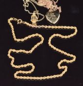 Three 9ct gold necklaces/chains, a 9ct gold clown pendant and a 9ct gold heart padlock, 13g