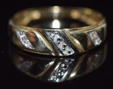 A 9ct gold ring set with diamonds, 1.2g, size N