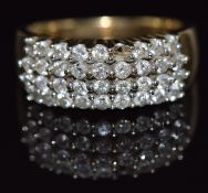 A 9ct gold ring set with four rows of diamonds, total diamond weight approximately 0.9ct, 5.5g, size