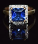 A 9ct gold ring set with a square cut synthetic sapphire and diamonds, 3.8g, size O/P