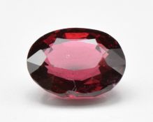 A loose 1.27ct oval cut natural spinel, with certificate