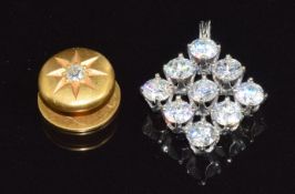 Victorian stud set with an old cut diamond (2.1g) and a white metal pendant set with cubic zirconia