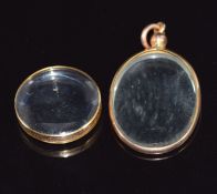 Two Edwardian yellow metal lockets