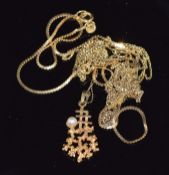 A 9ct gold pendant set with a pearl and 9ct gold chains , 8.2g