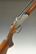 Rizzini 12 bore over and under shotgun with engraved sidelock plates, locks, trigger guards,