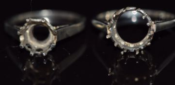A 14ct white gold ring mount (3.3g, size O) and an 18ct white gold ring mount (3.3g, size P)
