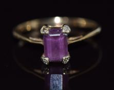 A 9ct gold ring set with an emerald cut amethyst,1.4g, size N