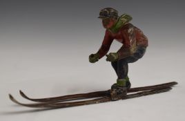 Cold painted bronze or similar skier, c1930s, L16.5cm