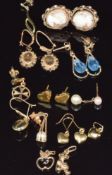 A collection of 9ct gold earrings including heart shape, cameo set, etc, 11.7g