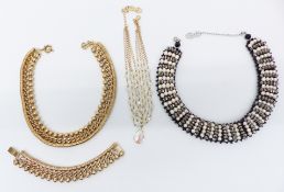 Two Butler & Wilson necklaces in original boxes and a matching necklace and bracelet, both in Butler