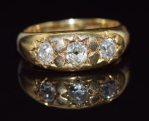 Edwardian 18ct gold ring set with three old cushion cut diamonds of approximately 0.4, 0.3 & 0.