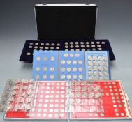A collection of UK shillings, George III onwards, in an aluminium collector's case, together with