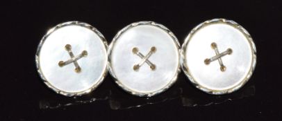 Three 18ct gold buttons set with mother of pearl, 5g