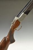 Browning B425 Grade 5 12 bore over and under shotgun with fine engraving featuring birds and dogs to