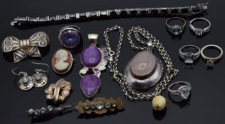 A collection of silver jewellery including two large pendants, bracelet, rings, Victorian paste