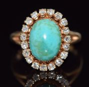 Early 19thC yellow metal ring set with a turquoise cabochon surrounded by diamonds, 4.5g, size K