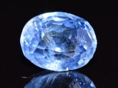 A loose oval cushion cut natural untreated Ceylon sapphire of approximately 3.87 ct with Gem & Pearl