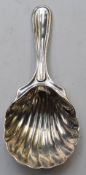 Edward VII hallmarked silver tea caddy spoon with shell bowl, Chester 1909, maker's mark HF,