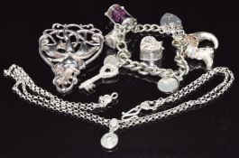 Art Nouveau silver brooch (Birmingham 1901), silver charms, and a silver necklace by OMG
