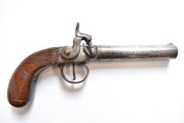 Percussion side hammer action pocket pistol with engraved lock, trigger guard and hammer, carved