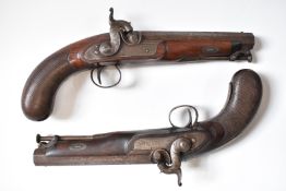 A pair of percussion hammer action pistols with locks signed 'Backwell Devonport', ornately engraved