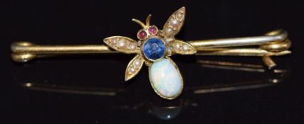 Edwardian brooch in the form of a fly set with an opal, sapphire, seed pearls and ruby eyes, 4cm,