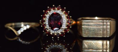 A 9ct gold ring set with garnets (4.6g, size P), a 9ct gold signet ring (0.8g, size N), and a 9ct