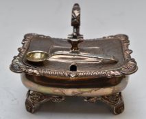 Victorian hallmarked silver footed mustard with scrolling C handle, shell decoration and blue